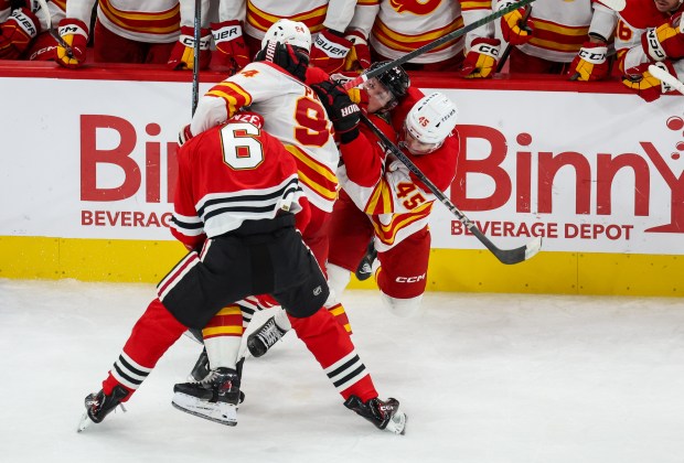 A scrum ensues between the Blackhawks and Calgary Flames within the last 30 seconds of the game during the third period, Nov. 18, 2025, at the United Center. (Dominic Di Palermo/Chicago Tribune)