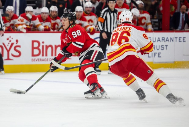 Blackhawks center Connor Bedard (98) shoots on goal during the first period against the Calgary Flames, Nov. 18, 2025, at the United Center. (Dominic Di Palermo/Chicago Tribune)