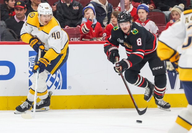Blackhawks center Ryan Donato rushes after the puck during the first period against the Nashville Predators, Nov. 28, 2025, at the United Center. (Dominic Di Palermo/Chicago Tribune)