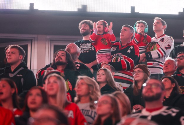 Fans cheer after the National Anthem before a game between the Chicago Blackhawks and the Nashville Predators, Nov. 28, 2025, at the United Center. (Dominic Di Palermo/Chicago Tribune)