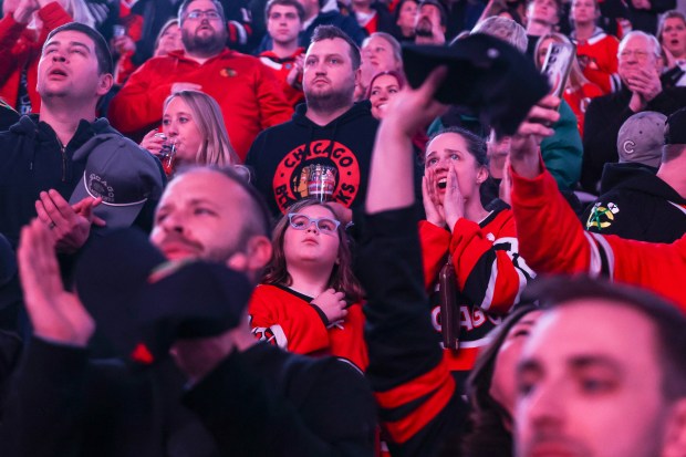 Fans cheer after the National Anthem before a game between the Chicago Blackhawks and the Nashville Predators, Nov. 28, 2025, at the United Center. (Dominic Di Palermo/Chicago Tribune)