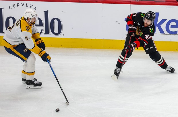 Blackhawks defenseman Matt Grzelcyk (48) shoots on goal during the second period against the Nashville Predators, Nov. 28, 2025, at the United Center. (Dominic Di Palermo/Chicago Tribune)