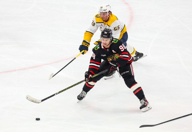 Blackhawks center Connor Bedard (98) handles the puck during the third period against the Nashville Predators, Nov. 28, 2025, at the United Center. (Dominic Di Palermo/Chicago Tribune)