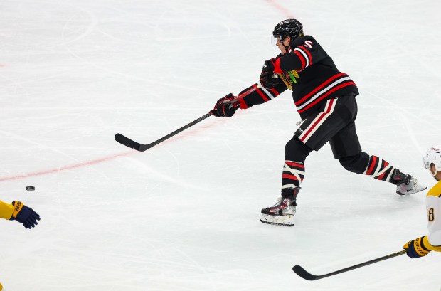 Blackhawks defenseman Connor Murphy (5) shoots on goal during the second period against the Nashville Predators, Nov. 28, 2025, at the United Center. (Dominic Di Palermo/Chicago Tribune)