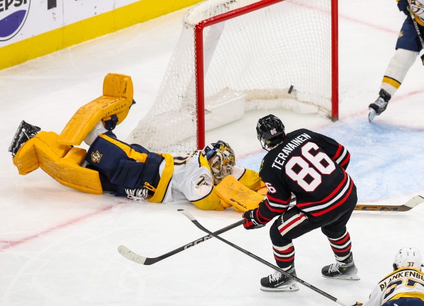 Blackhawks center Teuvo Teravainen (86) scores a goal past Nashville Predators goaltender Juuse Saros (74) during the third period, Nov. 28, 2025, at the United Center. (Dominic Di Palermo/Chicago Tribune)