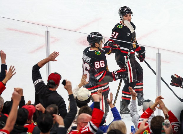 Blackhawks center Teuvo Teravainen (86) and center Frank Nazar (91) celebrate Teravinen's goal during the third period against the Nashville Predators, Nov. 28, 2025, at the United Center. (Dominic Di Palermo/Chicago Tribune)
