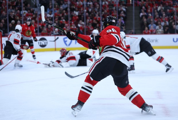 Blackhawks center Connor Bedard scores a goal in the first period against the Devils on Wednesday, Nov. 12, 2025, at the United Center. (Chris Sweda/Chicago Tribune)