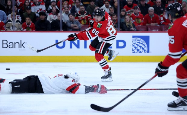 Blackhawks center Teuvo Teravainen takes a shot in the third period against the Devils on Wednesday, Nov. 12, 2025, at the United Center. (Chris Sweda/Chicago Tribune)