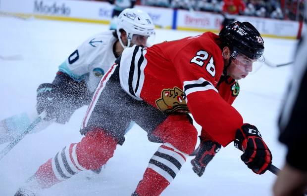 Chicago Blackhawks left wing Andre Burakovsky (28) skates after the puck in the first period of a game against the Seattle Kraken at the United Center in Chicago on Nov. 20, 2025. (Chris Sweda/Chicago Tribune)