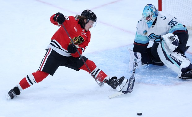 Chicago Blackhawks left wing Tyler Bertuzzi (59) fails to score on Seattle Kraken goaltender Joey Daccord (35) in the second period of a game at the United Center in Chicago on Nov. 20, 2025. (Chris Sweda/Chicago Tribune)
