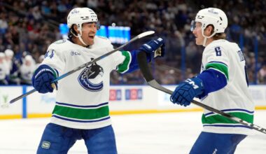 Canucks score five third-period goals to beat Lightning, end three-game skid