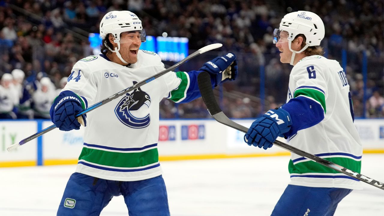 Canucks score five third-period goals to beat Lightning, end three-game skid