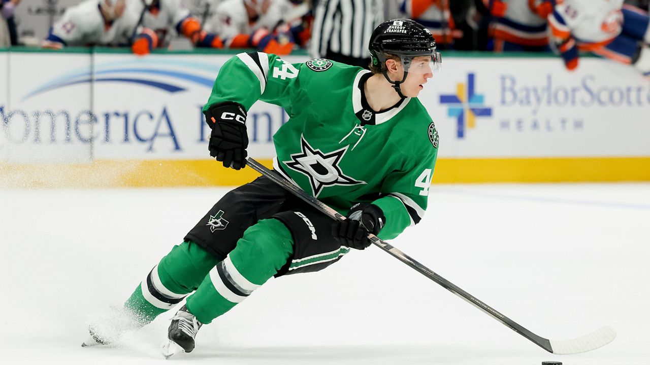 Dallas Stars defenseman Cody Ceci controls the puck during the second period of an NHL hockey game against the New York Islanders, Tuesday, Nov. 18, 2025, in Dallas. (AP Photo/Gareth Patterson)