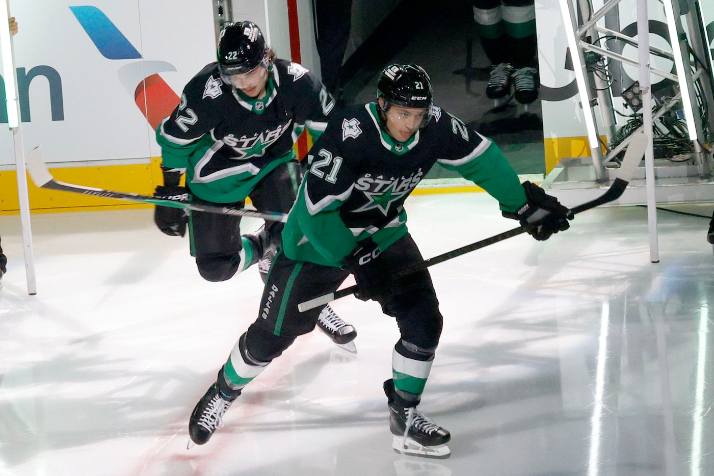 Dallas Stars left wing Jason Robertson (21) and Dallas Stars center Mavrik Bourque (22)...