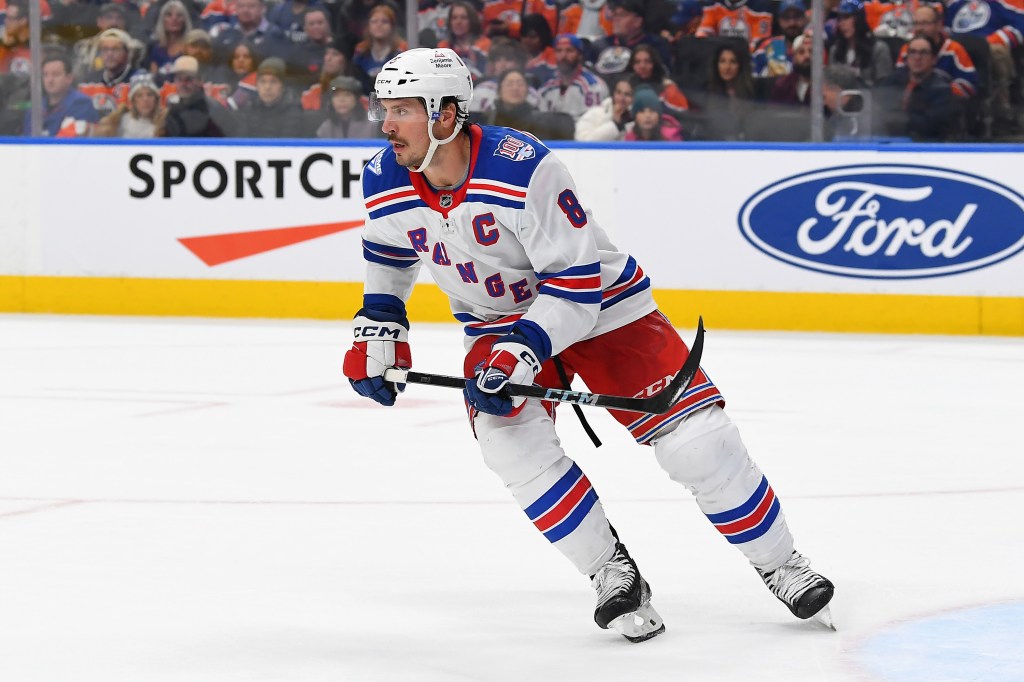 J.T. Miller in action during the game against the Edmonton Oilers at Rogers Place on October 30, 2025, in Edmonton, Alberta, Canada.