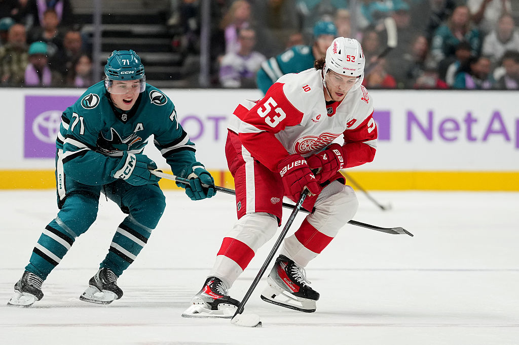 SAN JOSE, CALIFORNIA - NOVEMBER 02: Moritz Seider #53 of the Detroit Red Wings skates with the puck against the San Jose Sharks in overtime of an NHL hockey game at SAP Center on November 02, 2025 in San Jose, California. (Photo by Thearon W. Henderson/Getty Images)