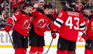NEWARK, NEW JERSEY - NOVEMBER 10 : Timo Meier #28 of the New Jersey Devils (center) celebrates with teammate Nico Hischier #13 (left) after scoring a goal during the first period of the NHL regular season game against the New York Islanders at the Prudential Center on November 10, 2025 in Newark, New Jersey. (Photo by Andrew Maclean/NHLI via Getty Images)