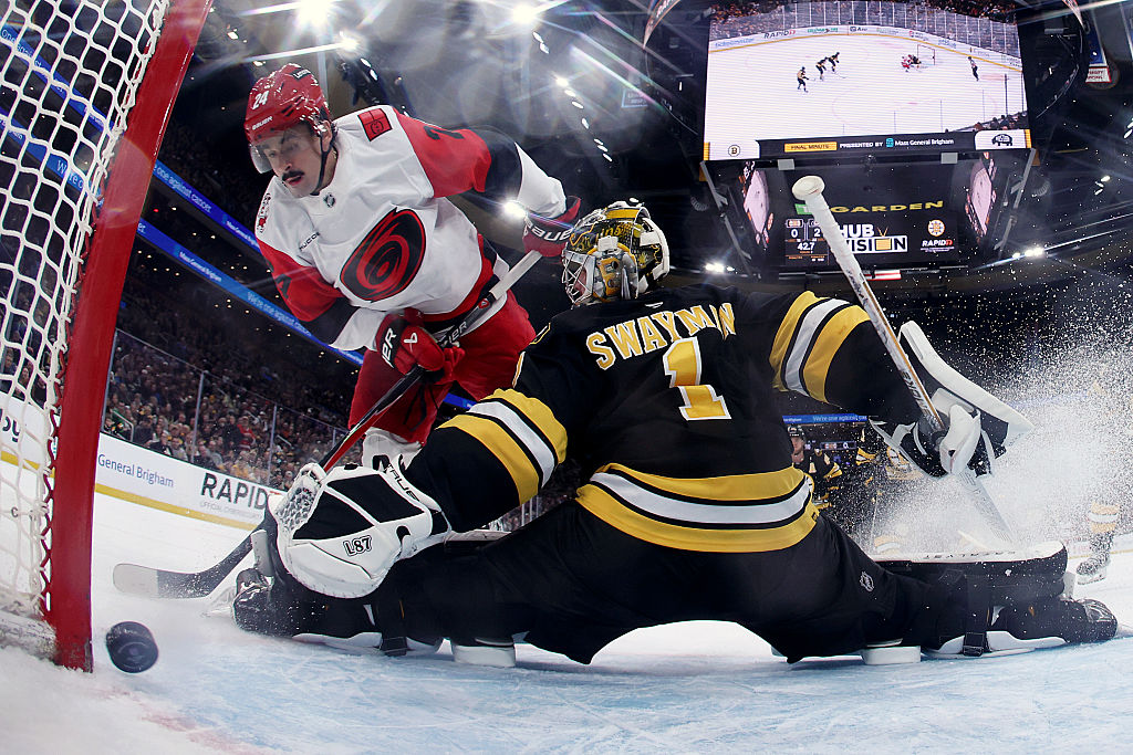 BOSTON, MASSACHUSETTS - NOVEMBER 17: Jeremy Swayman #1 of the Boston Bruins saves a shot on goal from Seth Jarvis #24 of the Carolina Hurricanes at TD Garden on November 17, 2025 in Boston, Massachusetts. The Hurricanes defeat the Bruins 3-0. (Photo by Maddie Meyer/Getty Images)