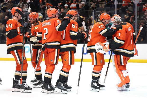 The Ducks’ Ryan Strome (16), Jackson Lacombe (2) and Ross...