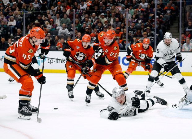 The Kings’ Jacob Moverare (43) blocks a pass from the...