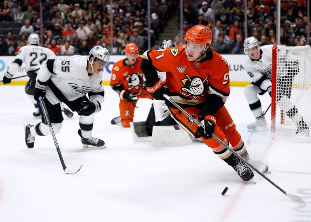 The Ducks’ Leo Carlsson collects a rebound and turns the...