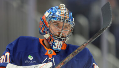 New York Islanders defenseman Matthew Schaefer (48) skates with the puck against the Boston Bruins during the first period at UBS Arena.