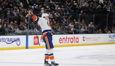 New York Islanders defenseman Matthew Schaefer (48) celebrates with New York Islanders goaltender Ilya Sorokin (30) after scoring a goal against the Vegas Golden Knights during the first period at T-Mobile Arena