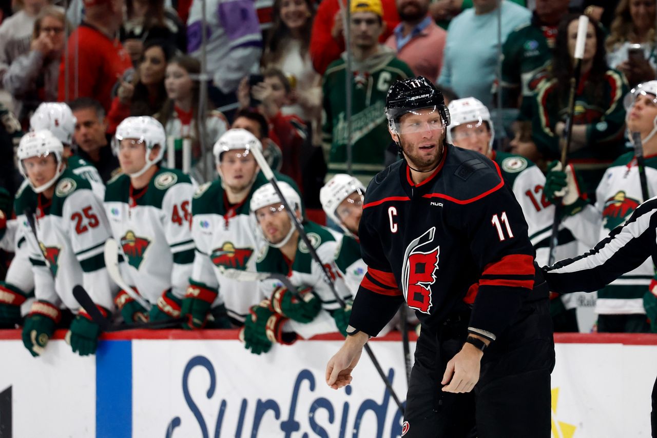Carolina Hurricanes' Jordan Staal (11) looks over toward an injured Jalen Chatfield, not shown, as he skates toward the penalty box during the first period of an NHL hockey game against the Minnesota Wild in Raleigh, N.C., Thursday, Nov. 6, 2025. (Associated Press)