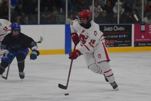 Junior Adalar Hovis (15) scored a pair of goals to help Grosse Ile salvage a 3-3 tie vs Carlson on Nov 26, 2025. (ALEXANDER MULLER -- MediaNews Group)