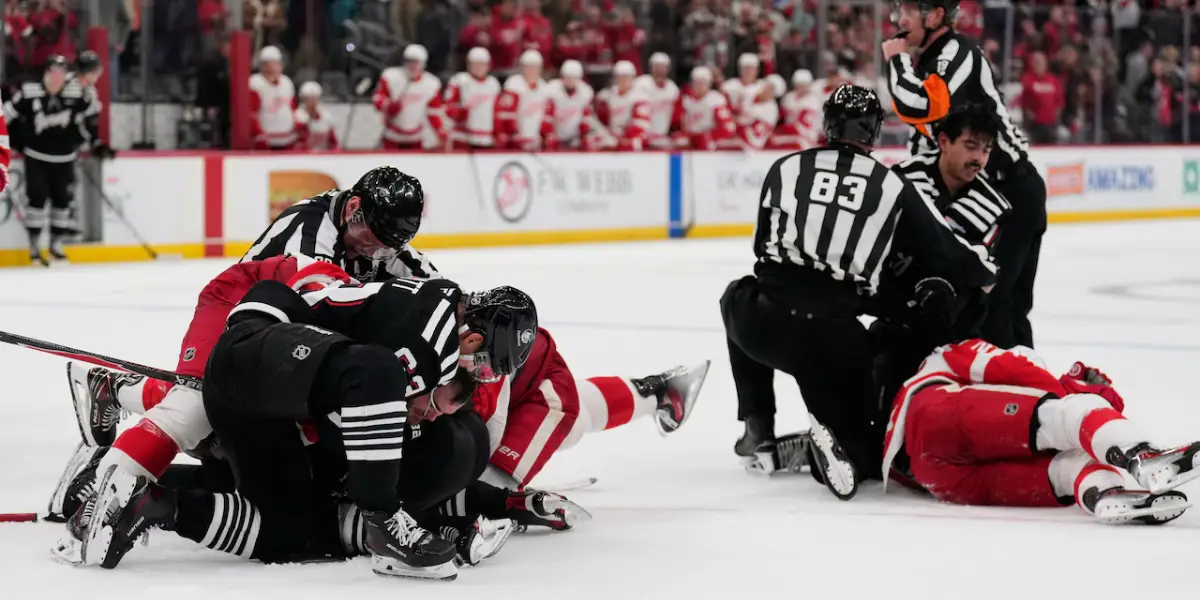 Jesper Bratt and Jonas Siegenthaler get the takedowns for the New Jersey Devils in a postgame scrum against the Detroit Red Wings on Monday, Nov. 24.
