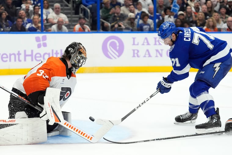 Lightning center Anthony Cirelli scores past Flyers goaltender Sam Ersson during Monday's game in Tampa.