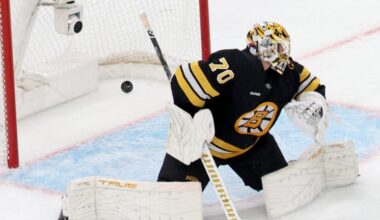 Boston Bruins goaltender Joonas Korpisalo (70) fails to block the puck during the first period of an NHL hockey game against the New York Rangers, Friday, Nov. 28, 2025, in Boston.