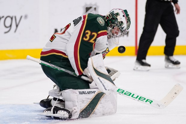 Minnesota Wild goaltender Filip Gustavsson (32) stops a shot during the second period of an NHL hockey game against the Nashville Predators, Tuesday, Nov. 4, 2025, in St. Paul, Minn. (AP Photo/Abbie Parr)