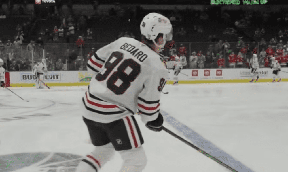 Connor Bedard #98 of the Chicago Blackhawks skates ahead of puck drop against the Dallas Stars on Oct. 26.