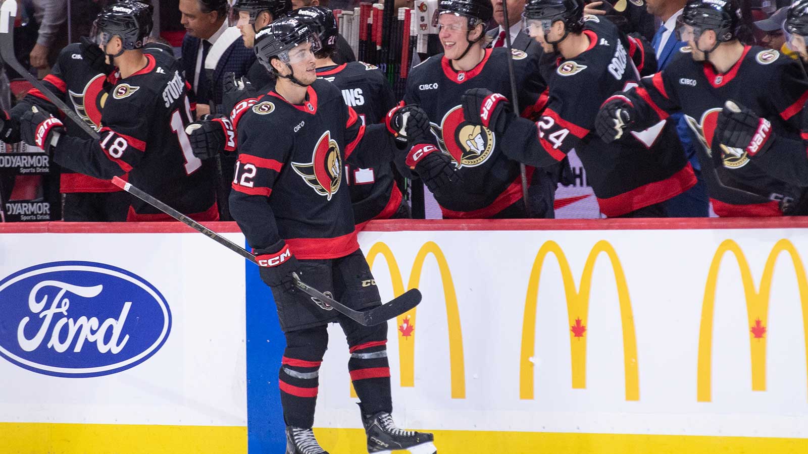 Ottawa Senators center Shane Pinto (12) celebrates with team his goal scored in the second period against the New York Islanders at the Canadian Tire Centre.