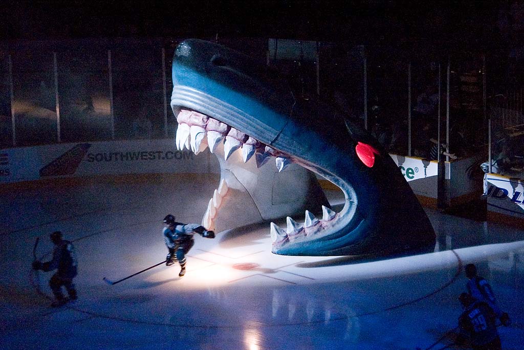 San Jose Sharks players skate onto the ice from through through the shark head before a game against the Columbus Blue Jackets at the HP Pavillion, now the SAP Center, in San Jose on March 16, 2007. (Elliot on Flickr, Wikimedia Commons)