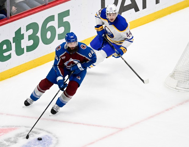 Colorado Avalanche defenseman Brent Burns (84) takes the puck up ice against Josh Dunne in the second period at Ball Arena in Denver on Thursday, Nov. 13, 2025. (Photo by Andy Cross/The Denver Post)
