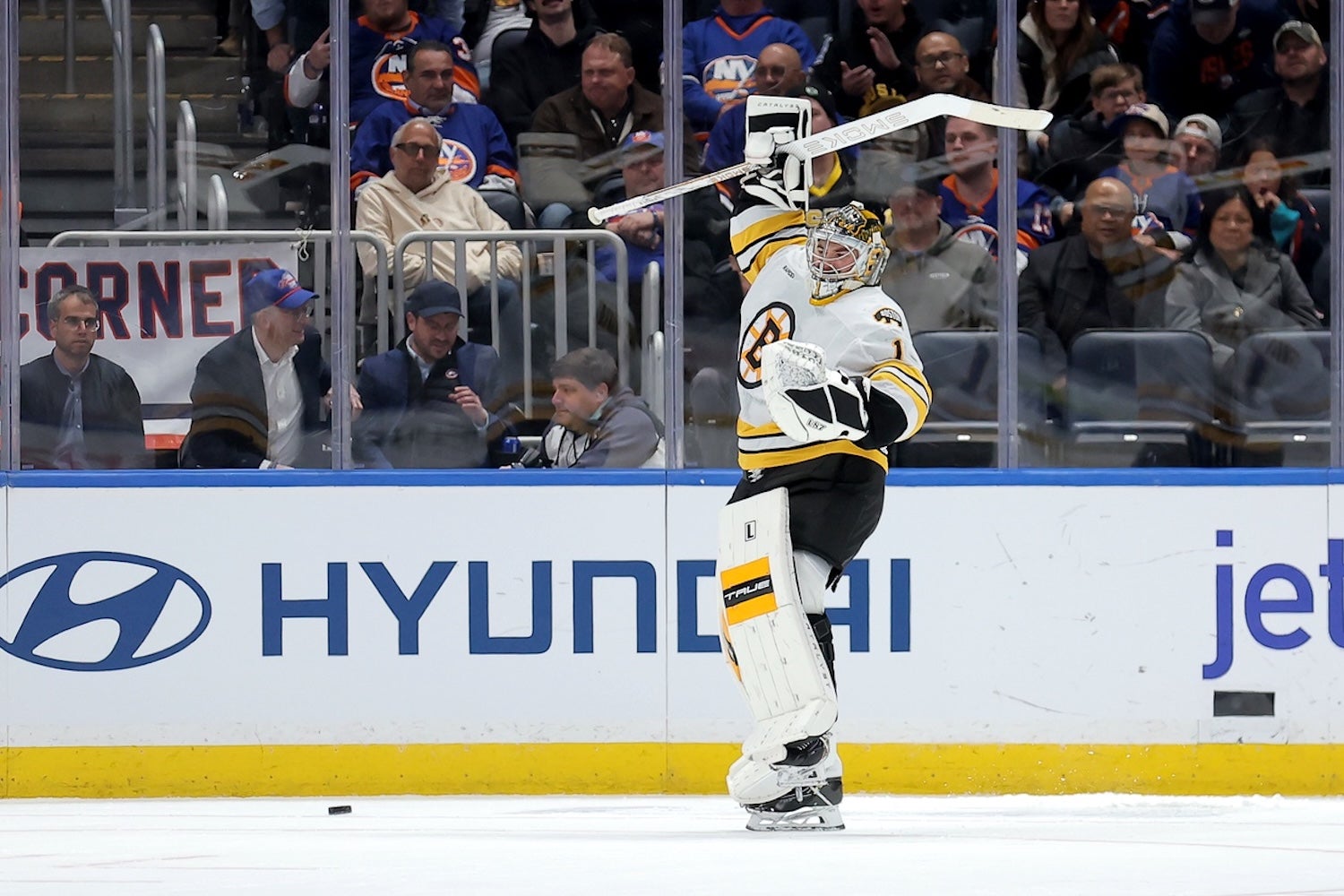 Nov 4, 2025; Elmont, New York, USA; Boston Bruins goaltender Jeremy Swayman (1) celebrates after defeating the New York Islanders in a shootout at UBS Arena. Mandatory Credit: Brad Penner-Imagn Images