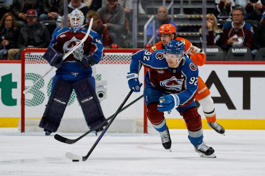 Colorado Avalanche left wing Gabriel Landeskog (92) skates the puck up ice in the second period against the Anaheim Ducks at Ball Arena. Mandatory Credit: Isaiah J. Downing-Imagn Images