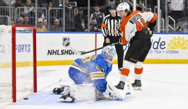 Nov 14, 2025; St. Louis, Missouri, USA; Philadelphia Flyers center Trevor Zegras (46) scores against St. Louis Blues goaltender Jordan Binnington (50) in shootouts at Enterprise Center.