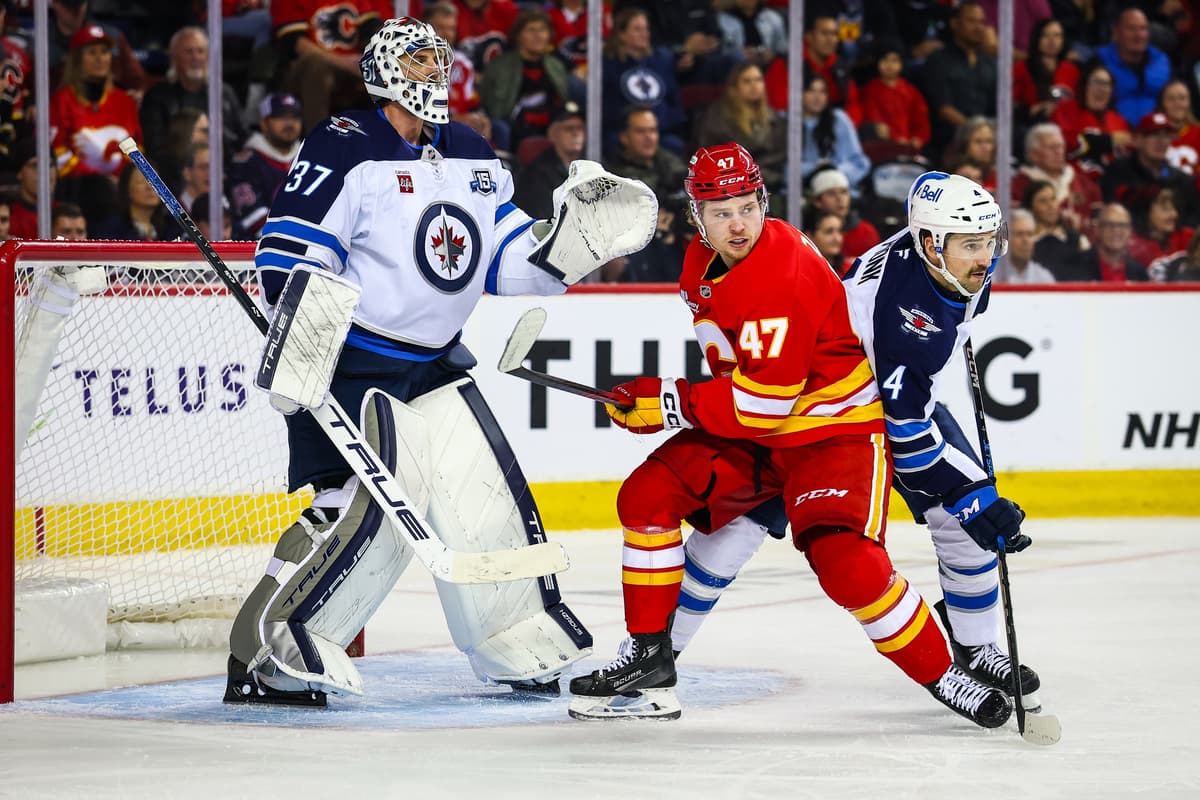 Flames earn a point in shootout loss to Jets