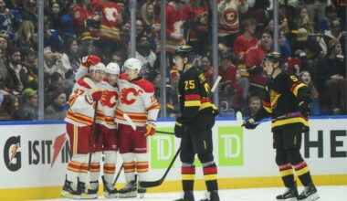 Flames sweep back to back with win in Vancouver
