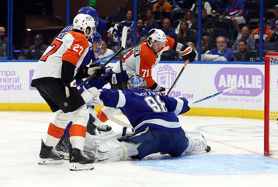 Nov 24, 2025; Tampa, Florida, USA; Tampa Bay Lightning goaltender Andrei Vasilevskiy (88) defends Philadelphia Flyers right wing Tyson Foerster (71) during the second period at Benchmark International Arena.