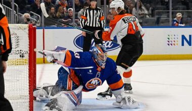Nov 28, 2025; Elmont, New York, USA; Philadelphia Flyers center Trevor Zegras (46) scores a goal past New York Islanders goaltender David Rittich (33) during shootouts period at UBS Arena.