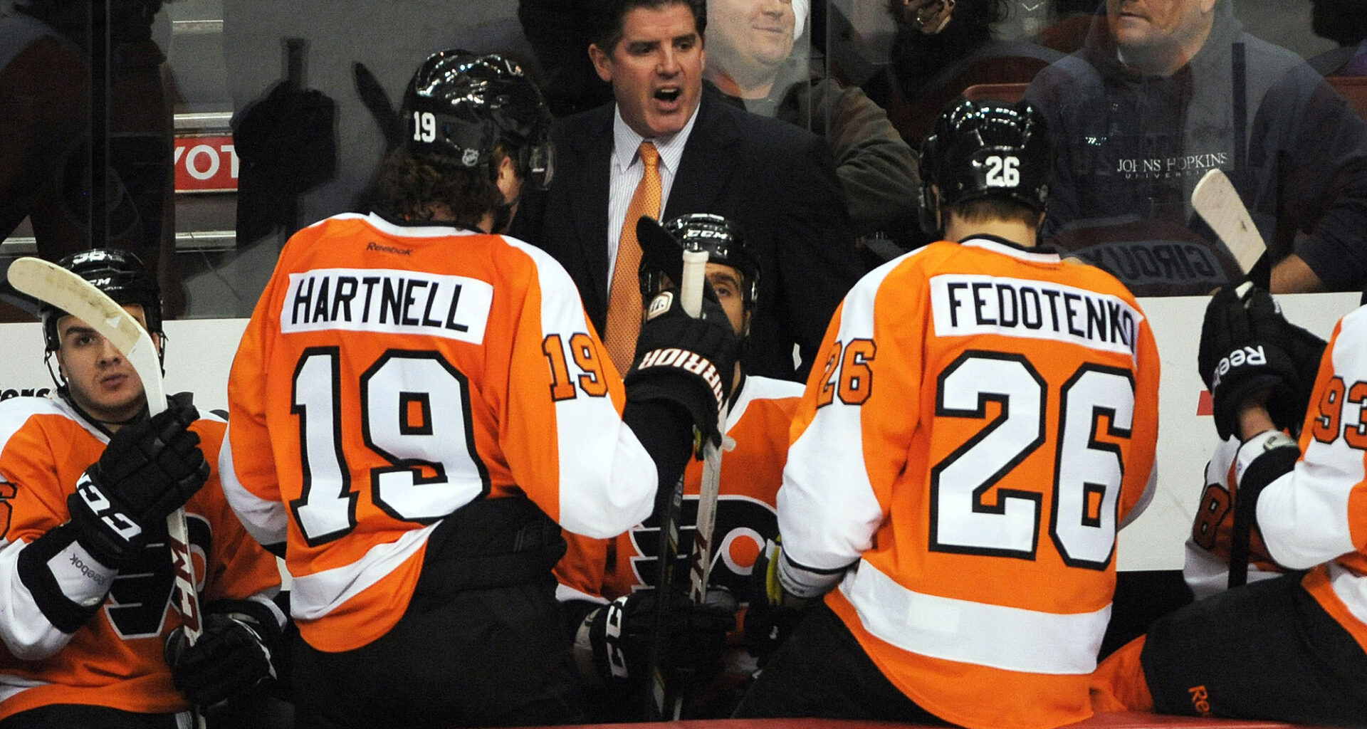 March 7, 2013; Philadelphia, PA, USA; Philadelphia Flyers head coach Peter Laviolette talks to his team during timeout against the Pittsburgh Penguins during the second period at the Wells Fargo Center.