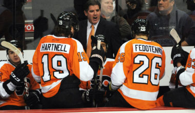 March 7, 2013; Philadelphia, PA, USA; Philadelphia Flyers head coach Peter Laviolette talks to his team during timeout against the Pittsburgh Penguins during the second period at the Wells Fargo Center.