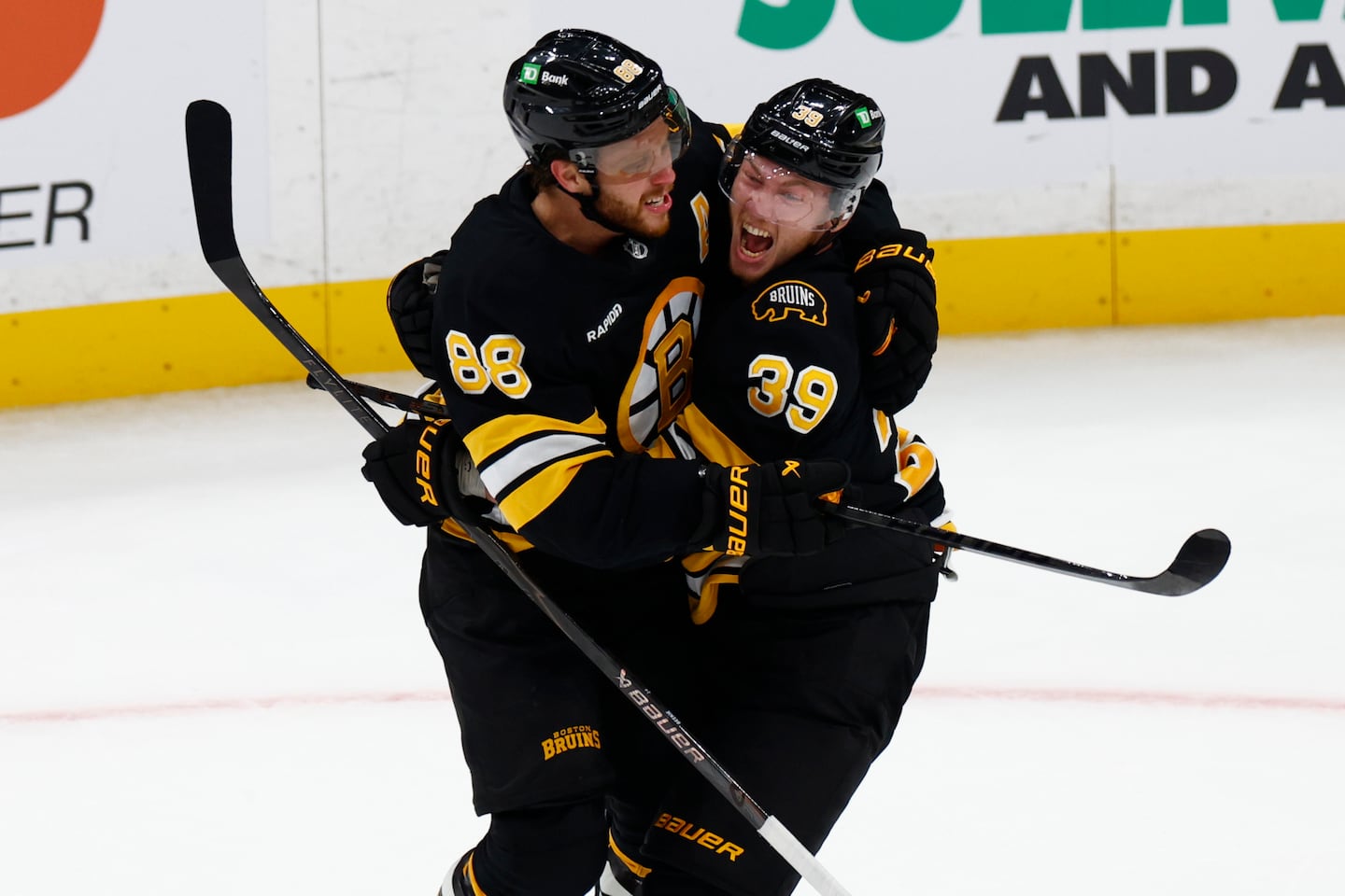 David Pastrnak (left) could be welcoming Morgan Geekie into the Bruins' 60-goal club later this season.