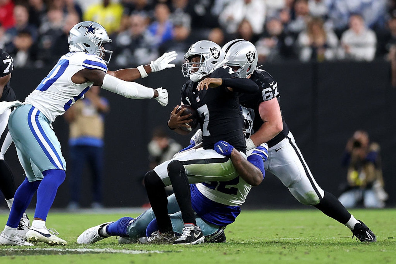Dallas Cowboys defensive tackle Quinnen Williams sacks Las Vegas Raiders quarterback Geno Smith during an NFL game on Monday, Nov. 17, 2025, at Allegiant Stadium in Las Vegas, Nev.