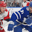 Toronto Maple Leafs forward John Tavares (91) and Carolina Hurricanes forward Logan Stankoven (22) chase after a loose puck during the first period at Scotiabank Arena.