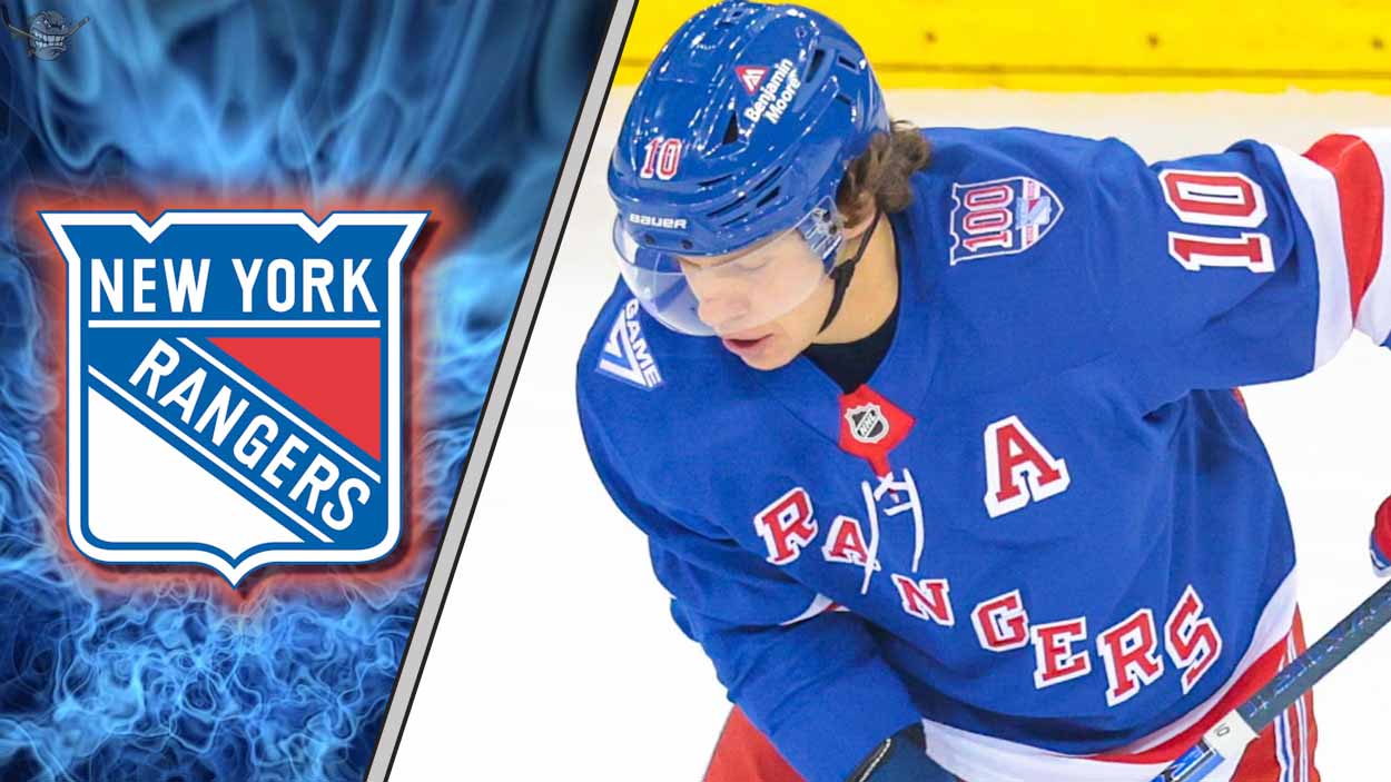 Artemi Panarin of the New York Rangers looking down ice during a game, subject of trade rumors to Carolina and Minnesota.
